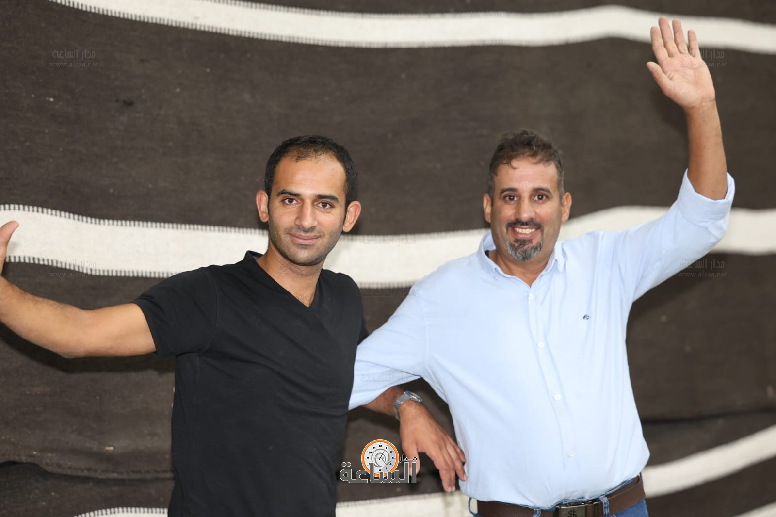 Madar Al-Saa Images 0.2432343366655807