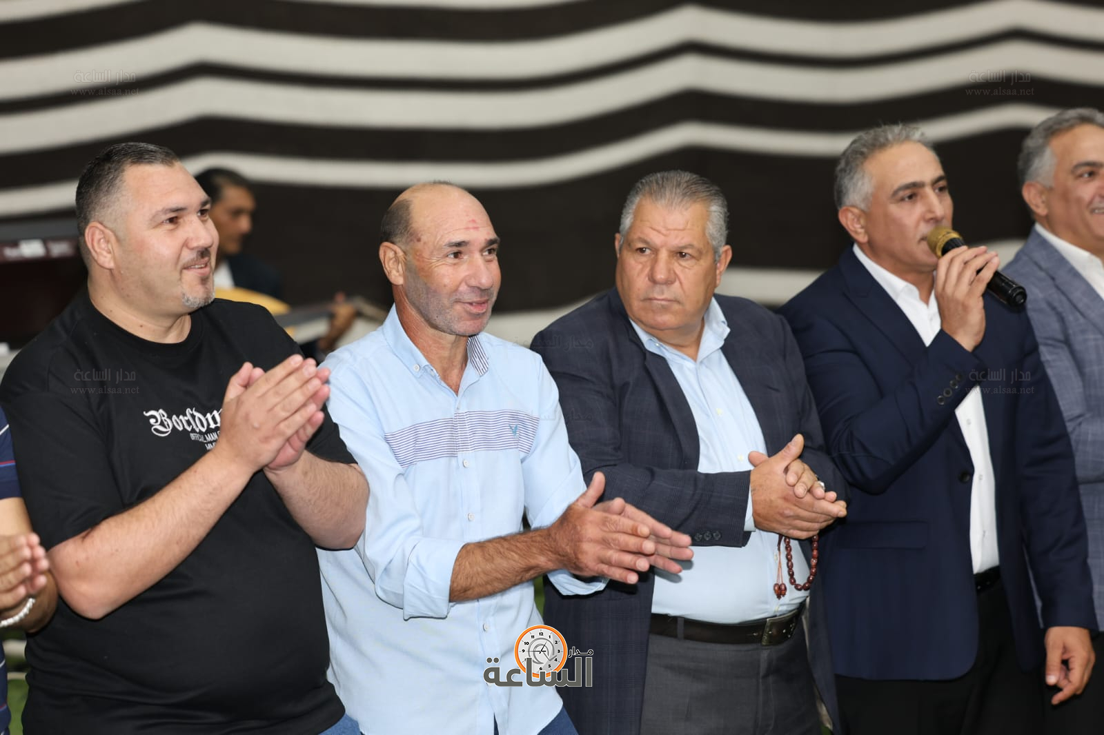 Madar Al-Saa Images 0.4650465052739874