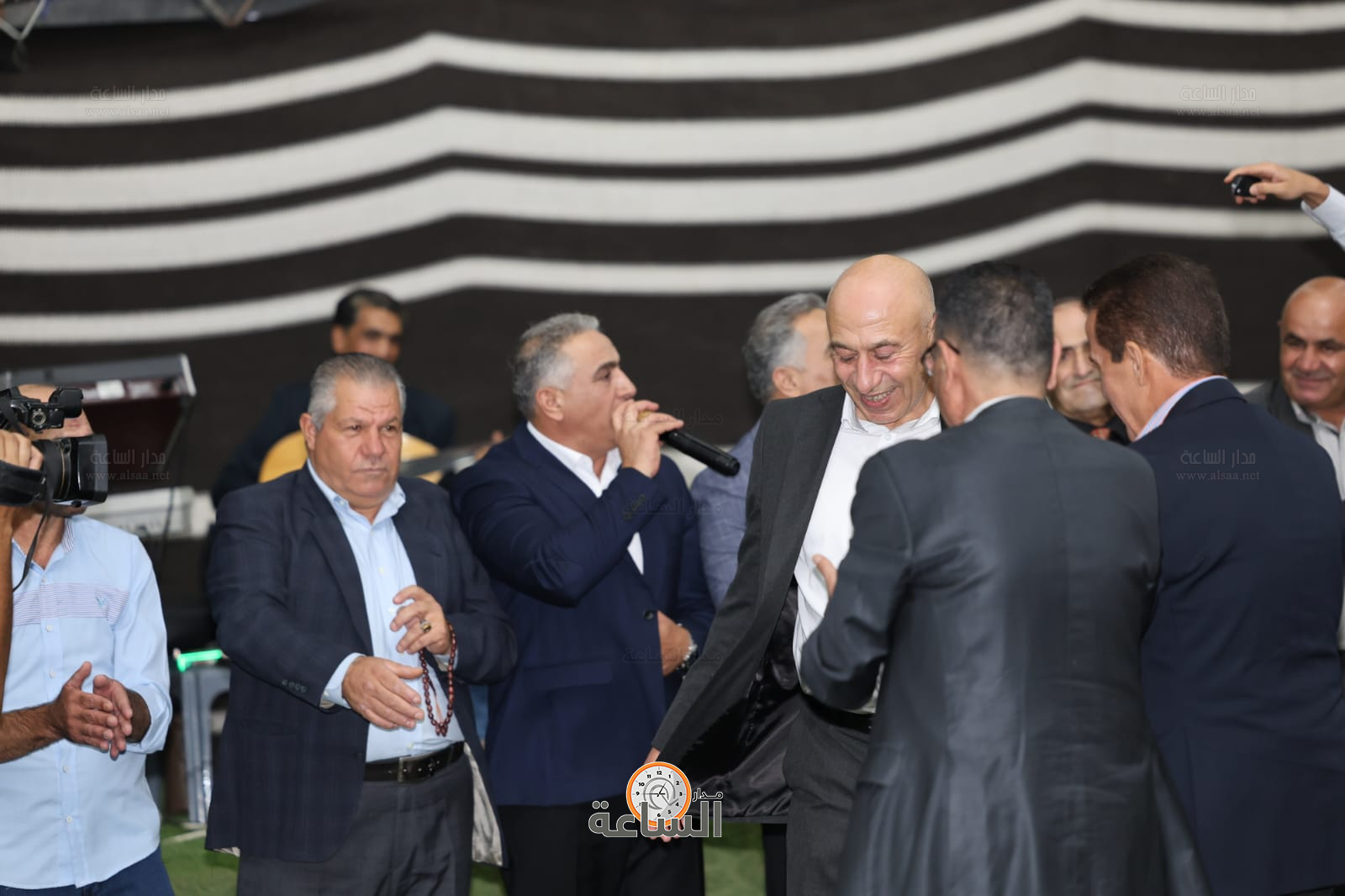 Madar Al-Saa Images 0.6376296272647486