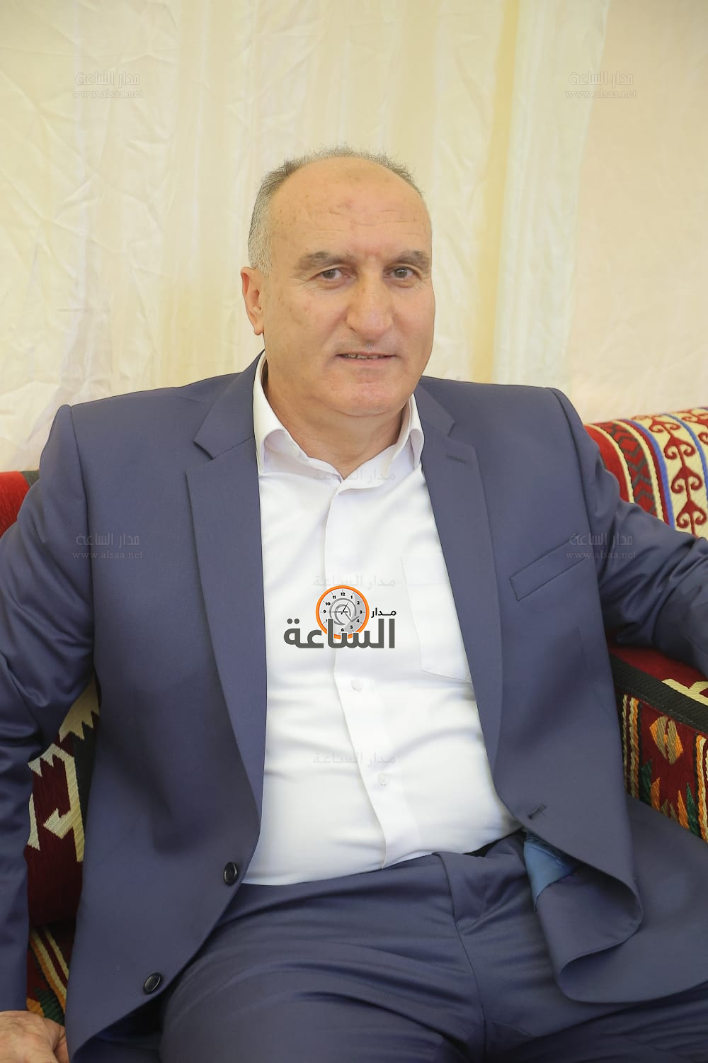 Madar Al-Saa Images 0.980810624023125