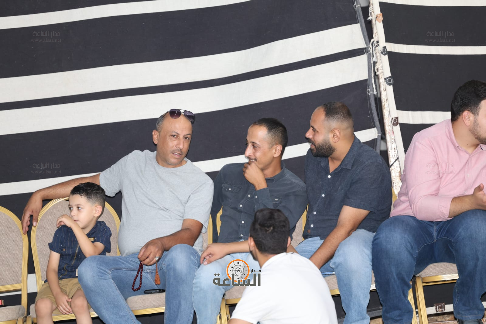 Madar Al-Saa Images 0.7356742788101422