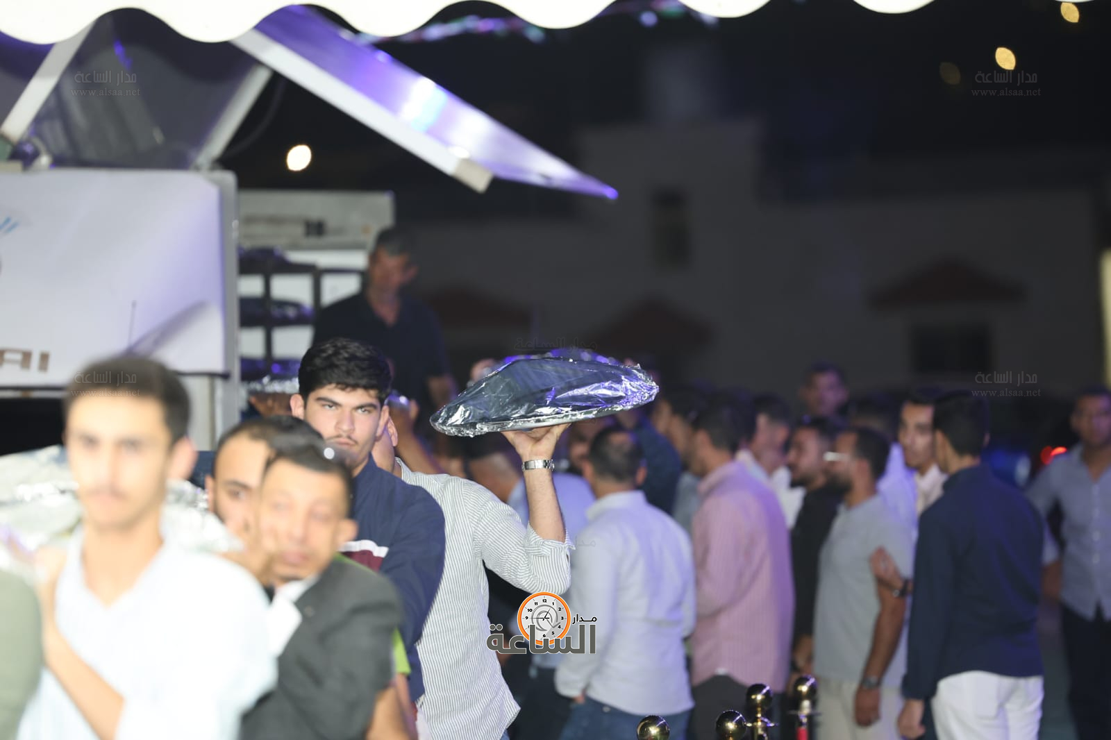 Madar Al-Saa Images 0.7295376169773279