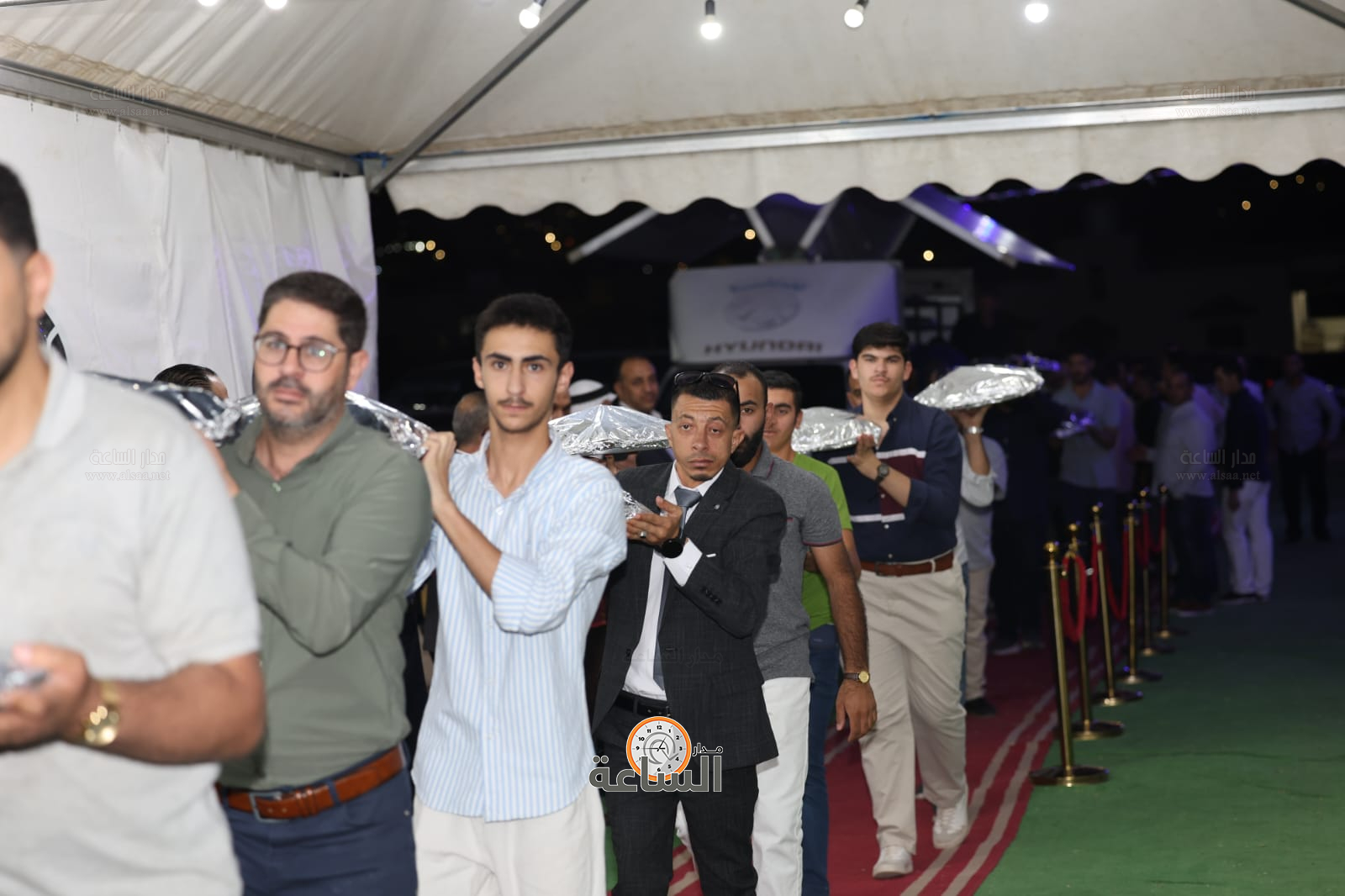 Madar Al-Saa Images 0.845104007680612