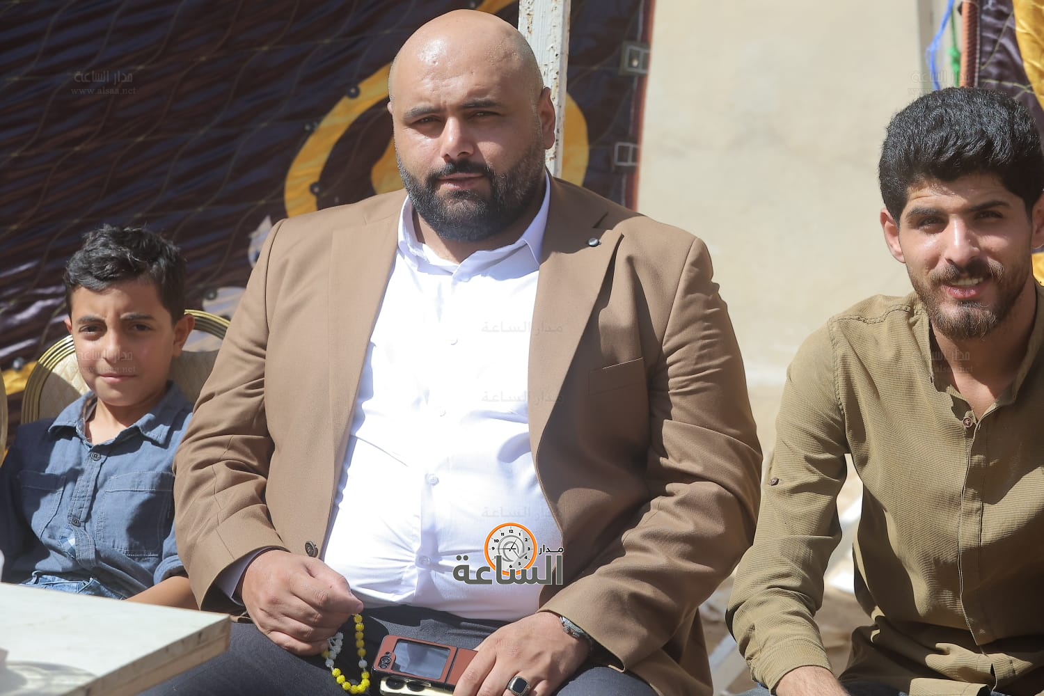 Madar Al-Saa Images 0.5674426328804079