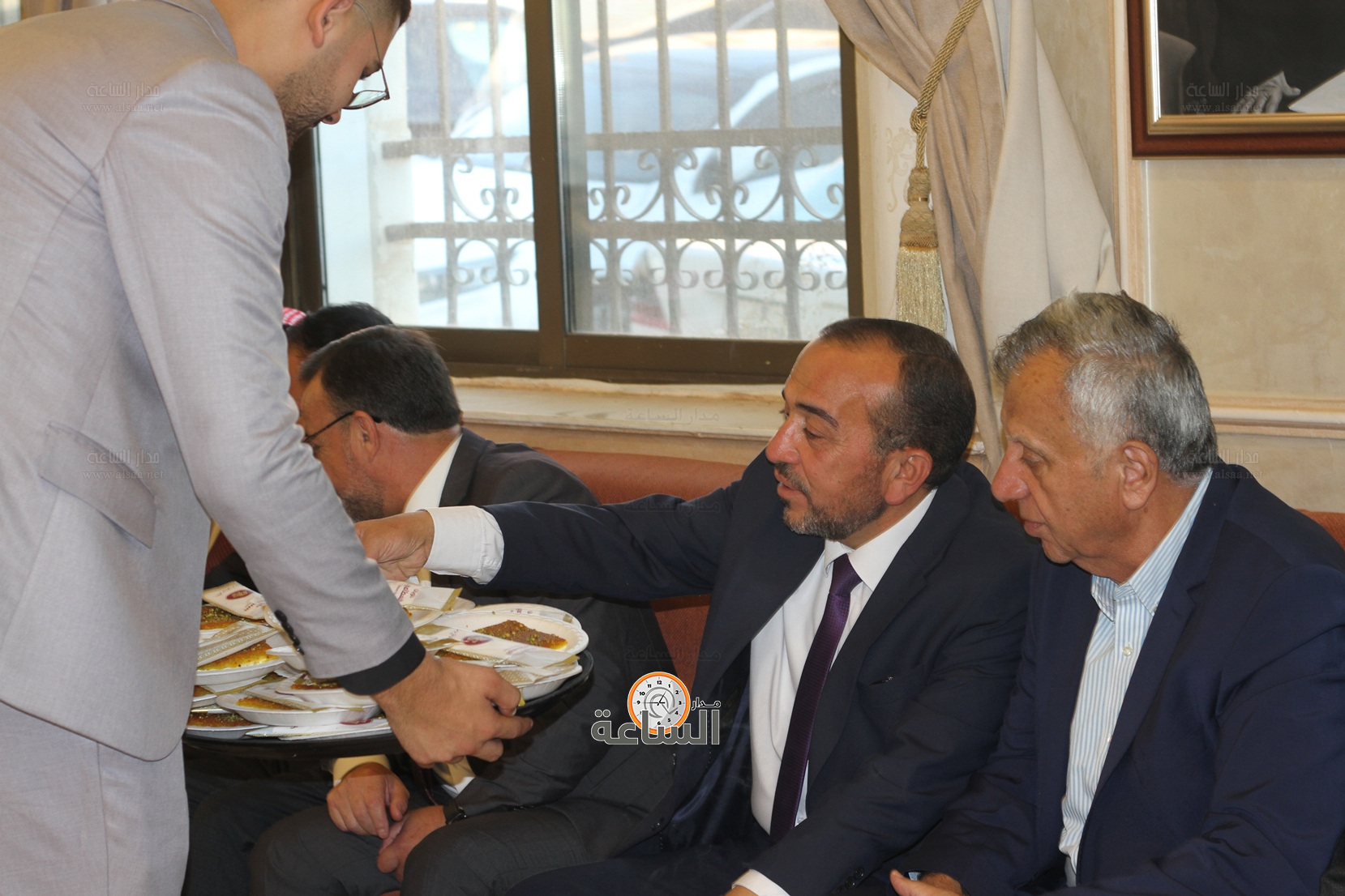 Madar Al-Saa Images 0.6223335601981184