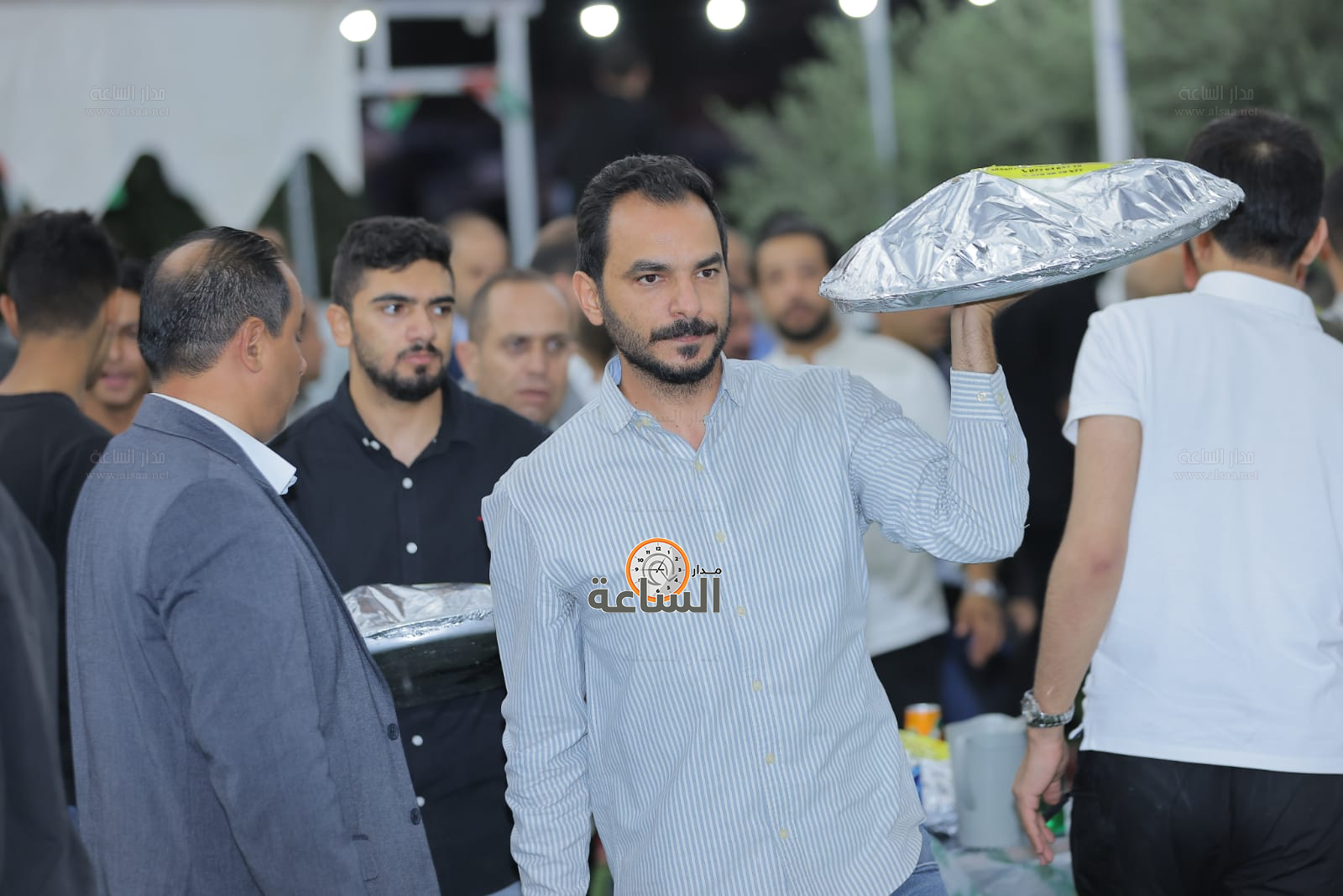 Madar Al-Saa Images 0.7107405623540896