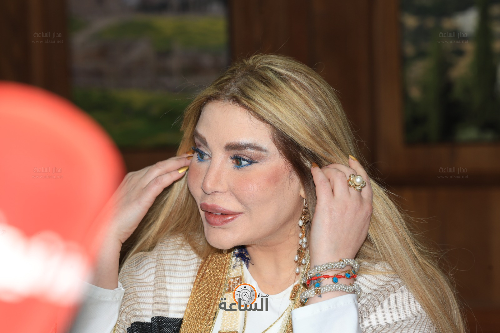 Madar Al-Saa Images 0.3158479852449749