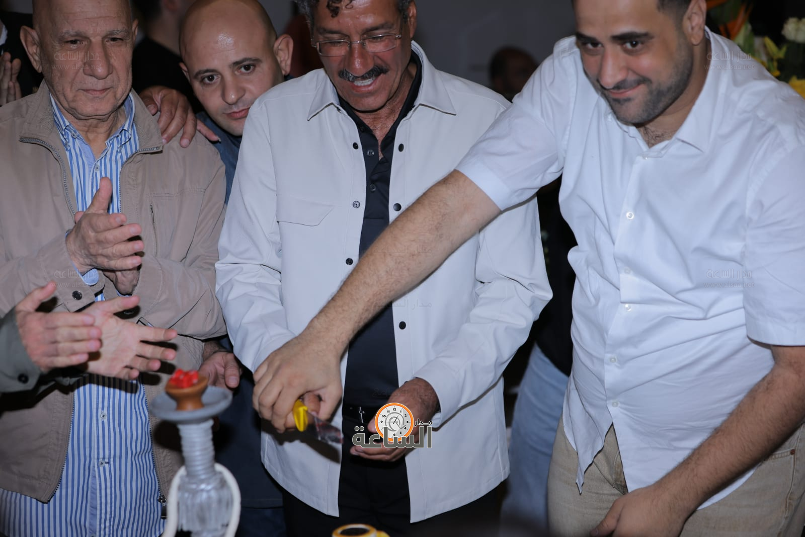 Madar Al-Saa Images 0.3662344193418898