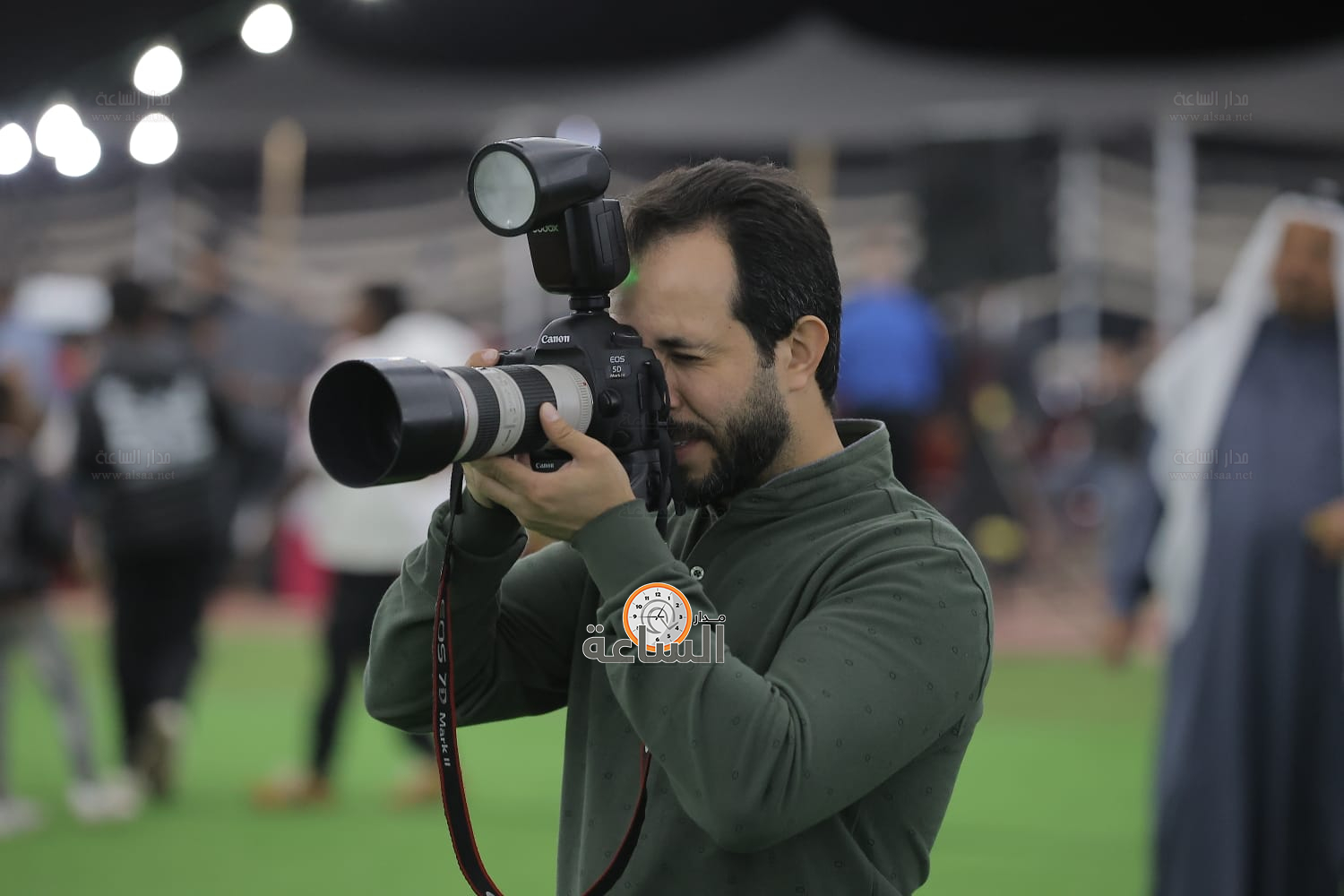 Madar Al-Saa Images 0.1538297666136329