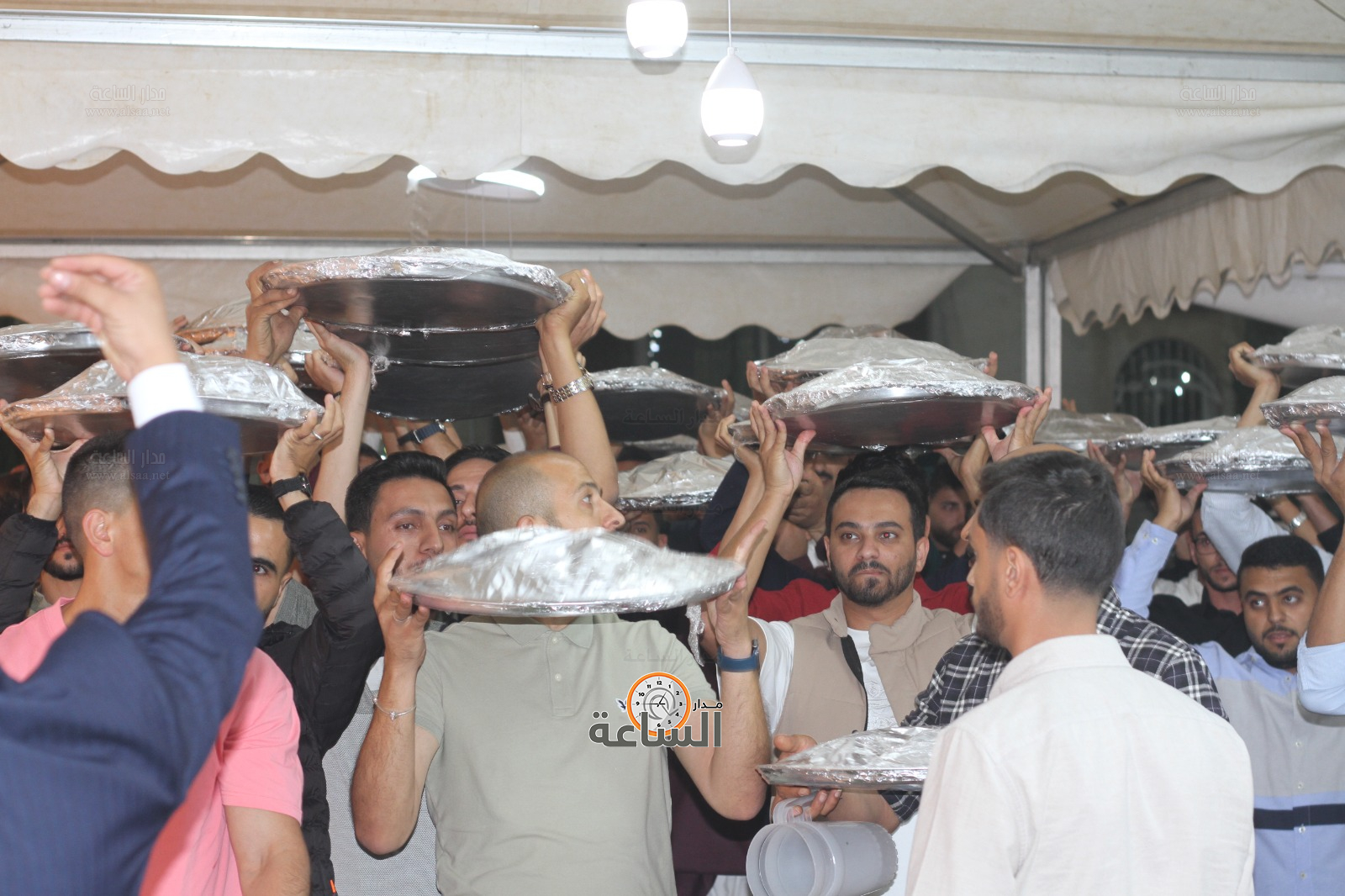 Madar Al-Saa Images 0.6103342915985157