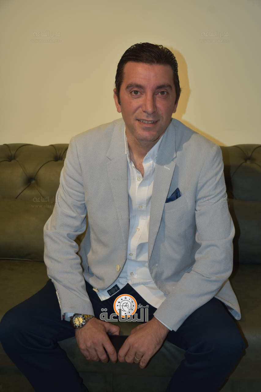 Madar Al-Saa Images 0.623351338637662