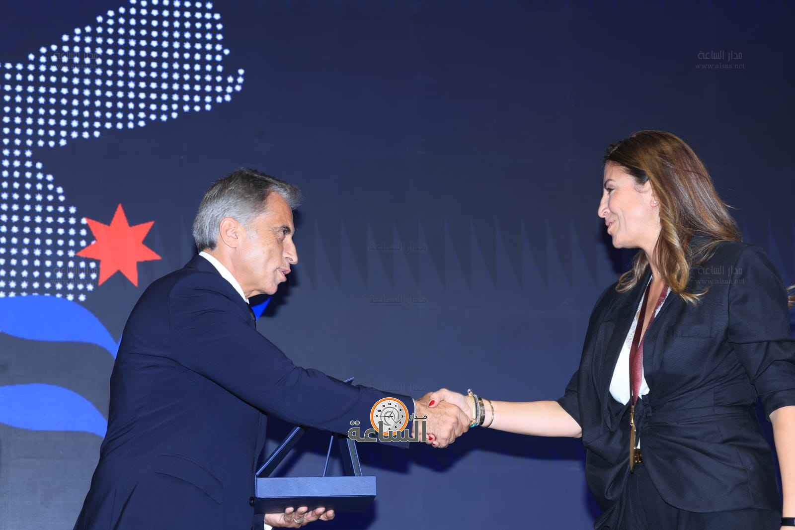 Madar Al-Saa Images 0.6989225561380742