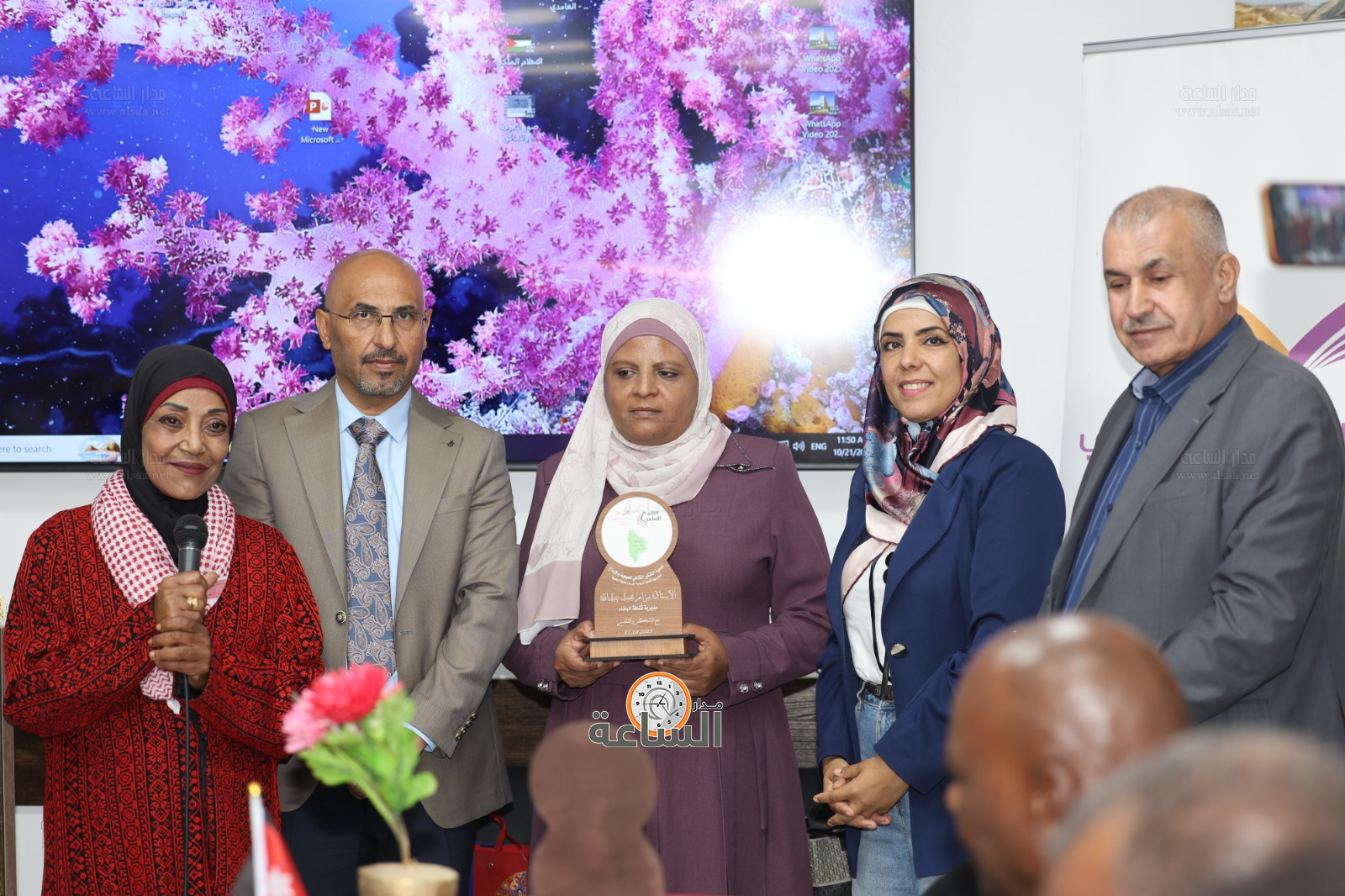 Madar Al-Saa Images 0.00946450984426117