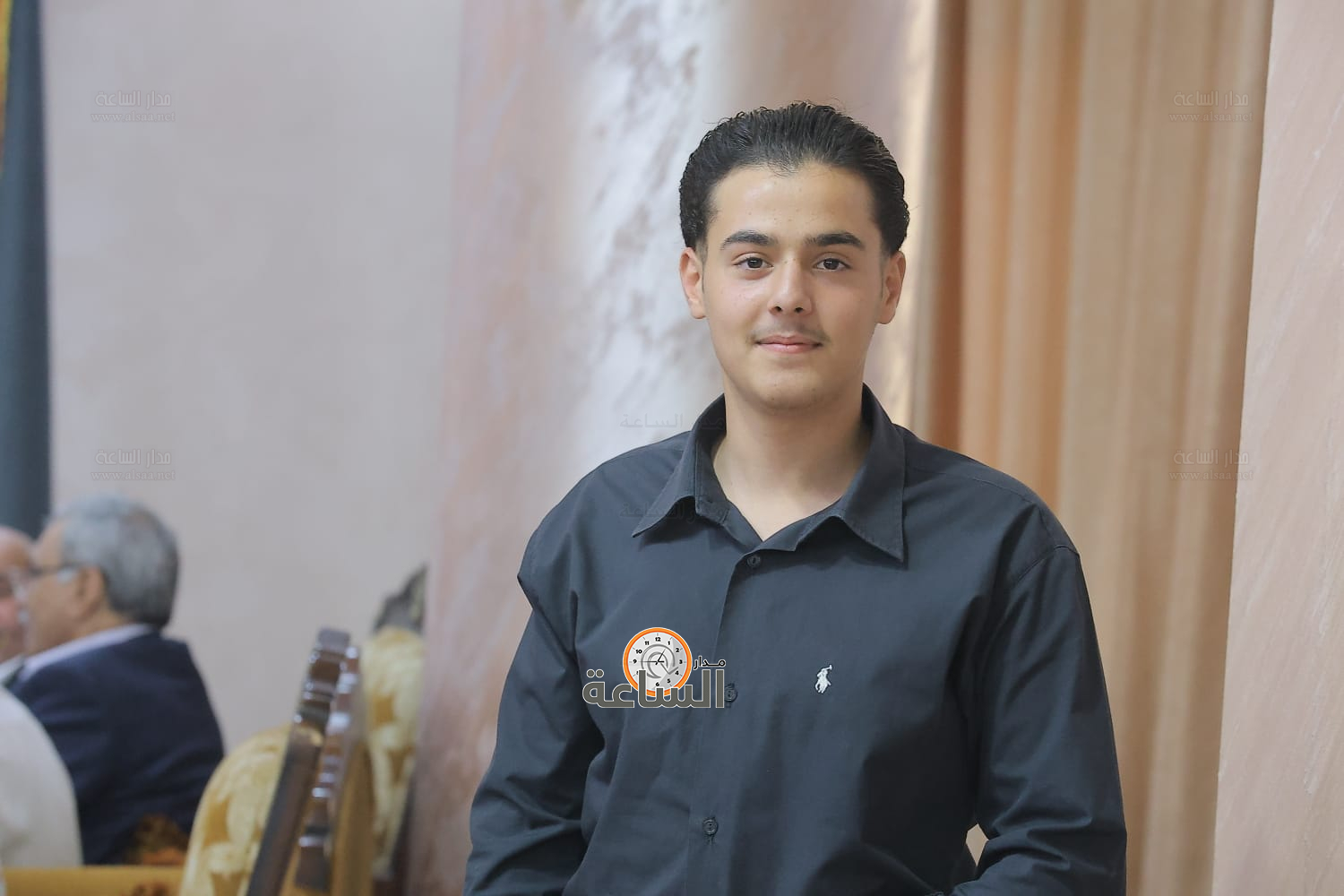 Madar Al-Saa Images 0.943905351532717