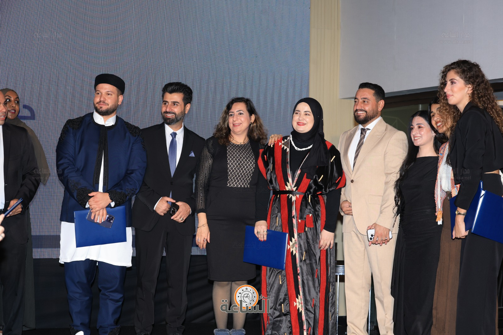 Madar Al-Saa Images 0.0326916333167534