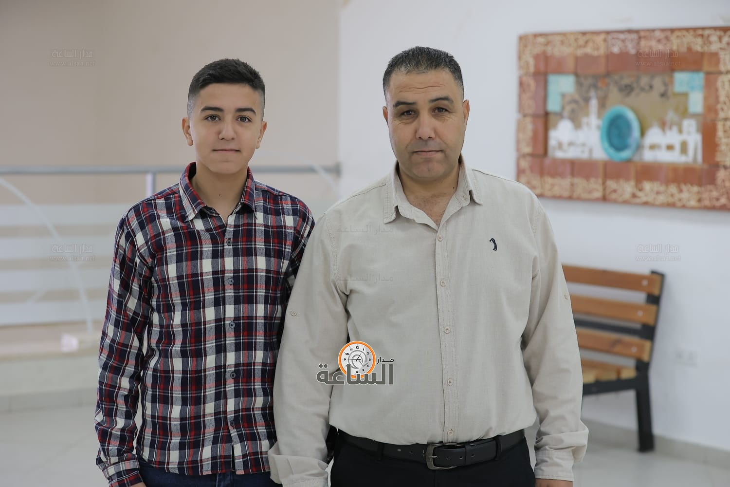 Madar Al-Saa Images 0.3010251936293107