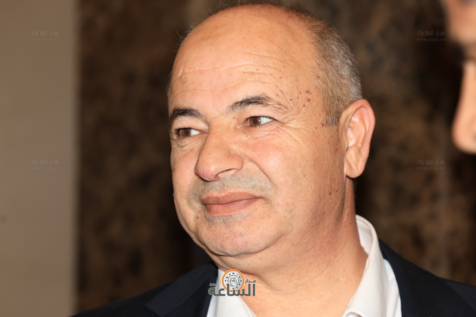 Madar Al-Saa Images 0.8783303839875084