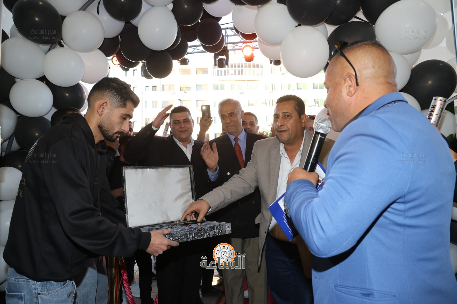 Madar Al-Saa Images 0.4843601570356644