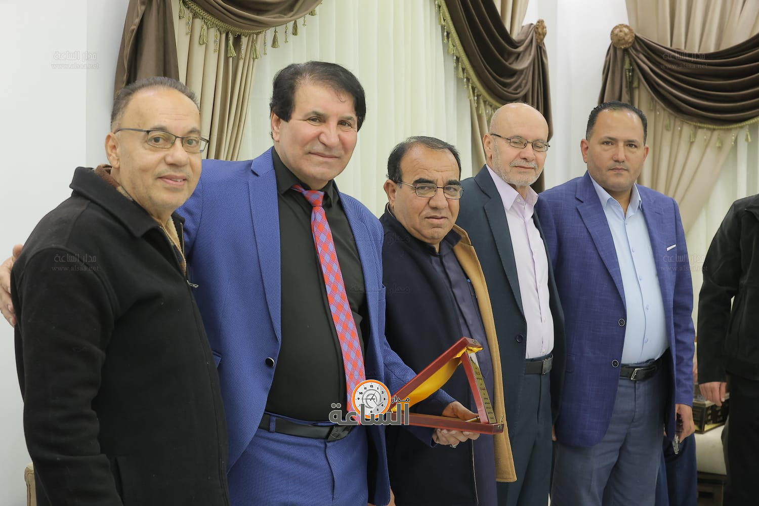 Madar Al-Saa Images 0.6780710712749386