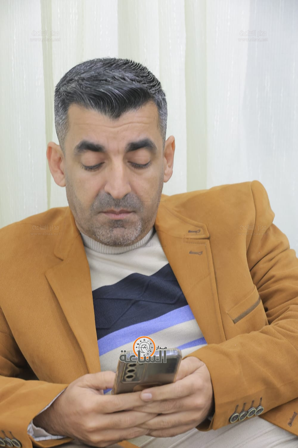 Madar Al-Saa Images 0.5409404819404989