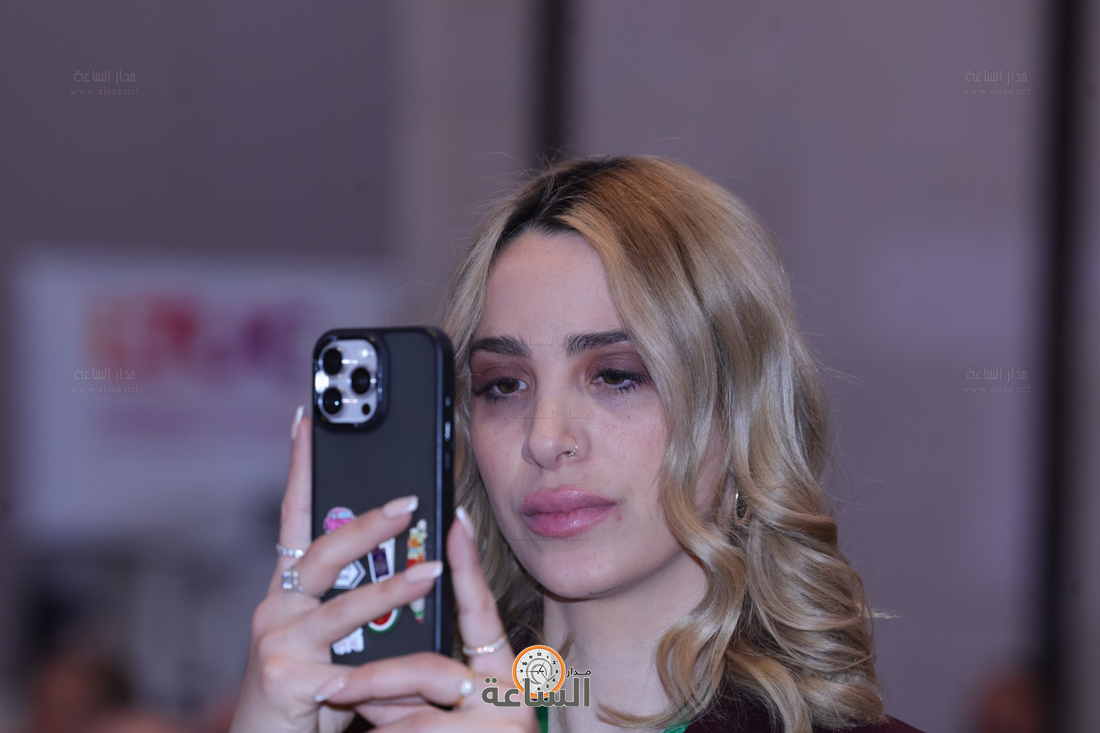 Madar Al-Saa Images 0.6473128753957114