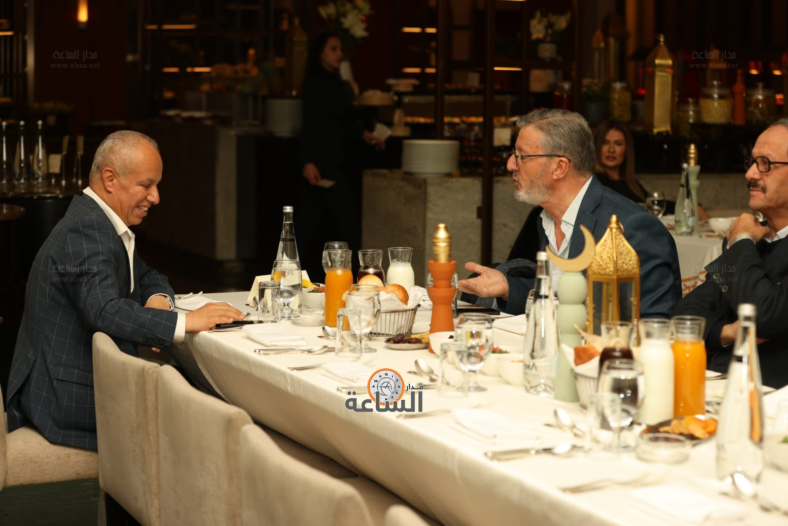 Madar Al-Saa Images 0.43971065715679736