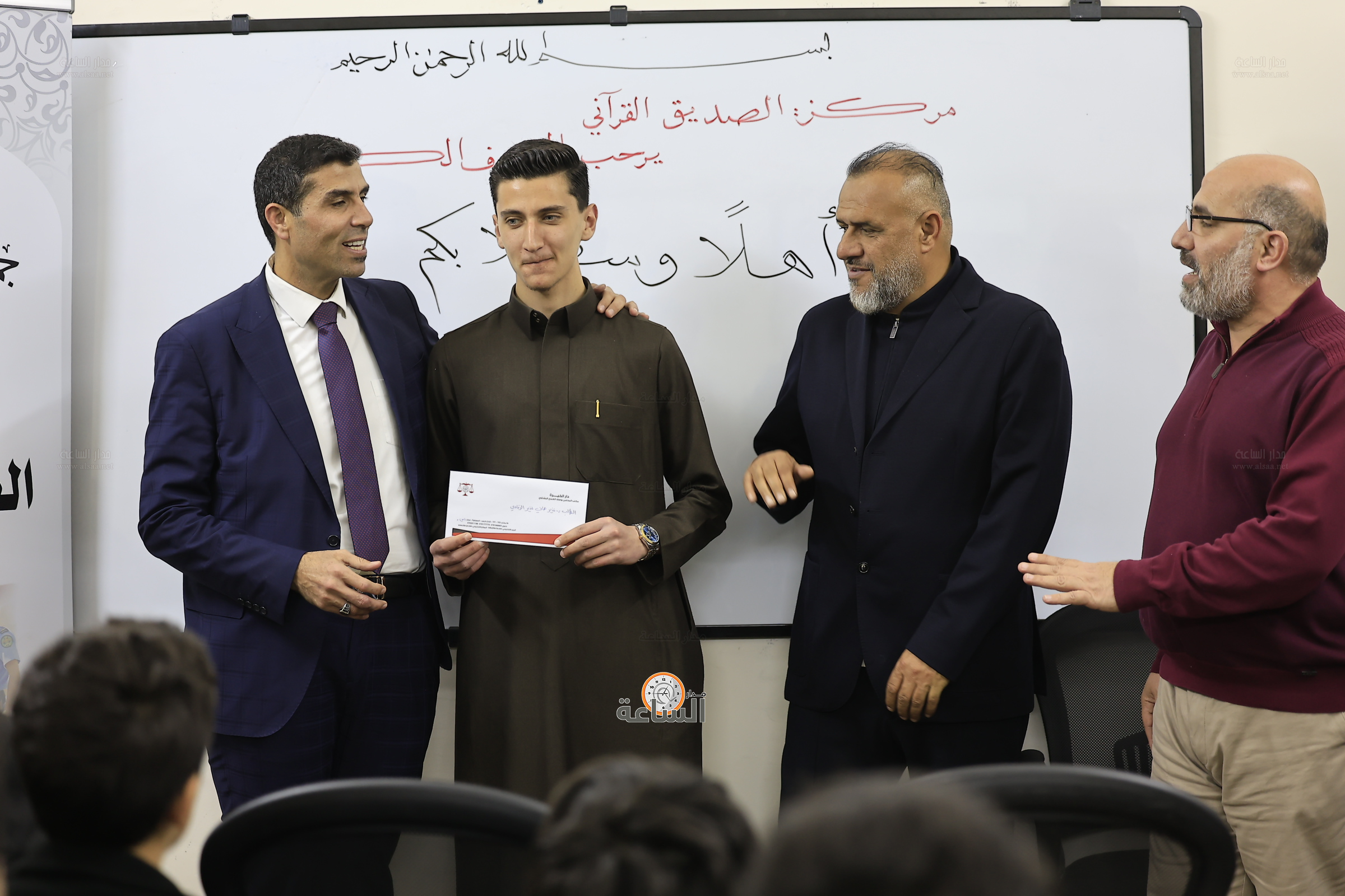 Madar Al-Saa Images 0.552107476592363