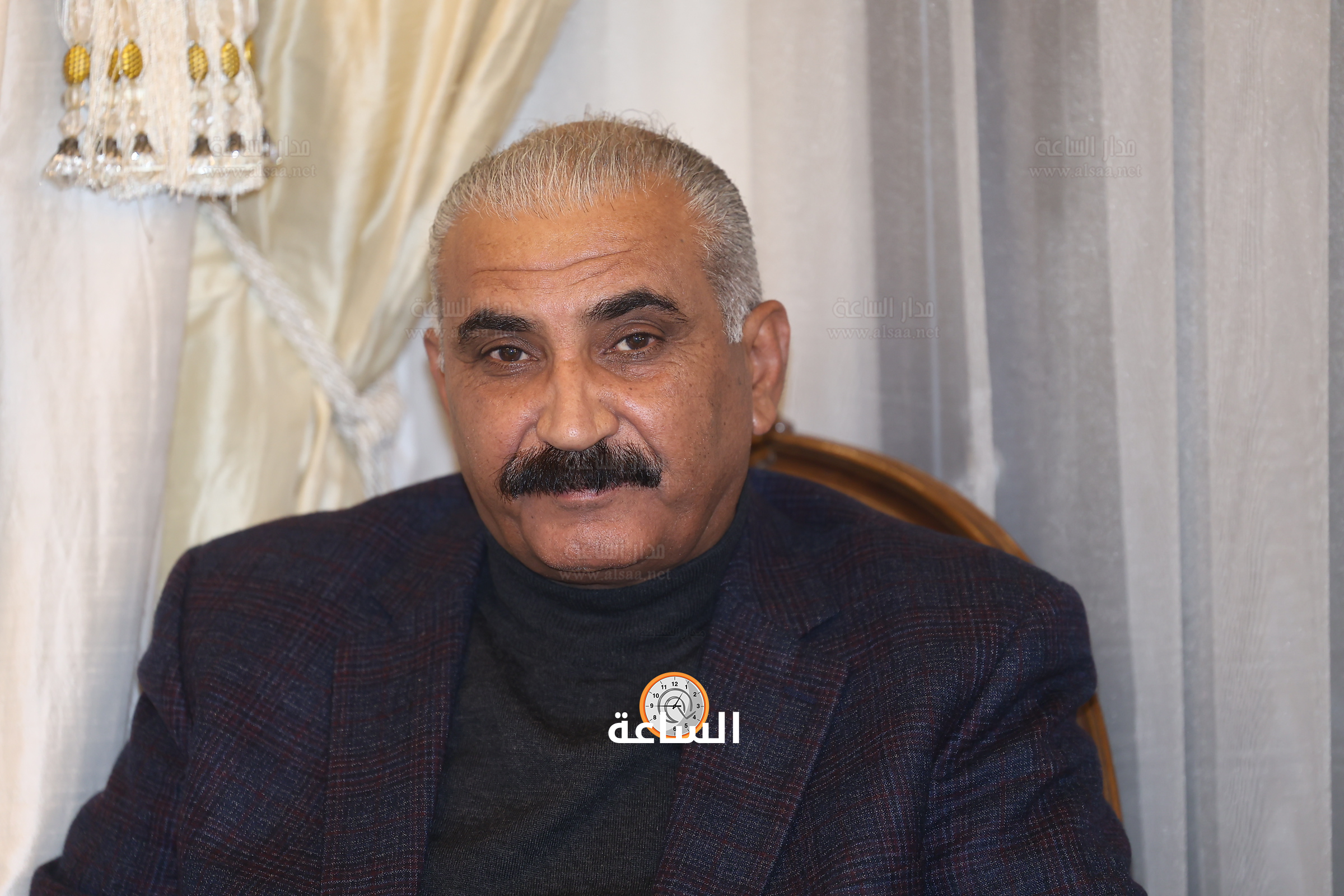 Madar Al-Saa Images 0.25498670344725427