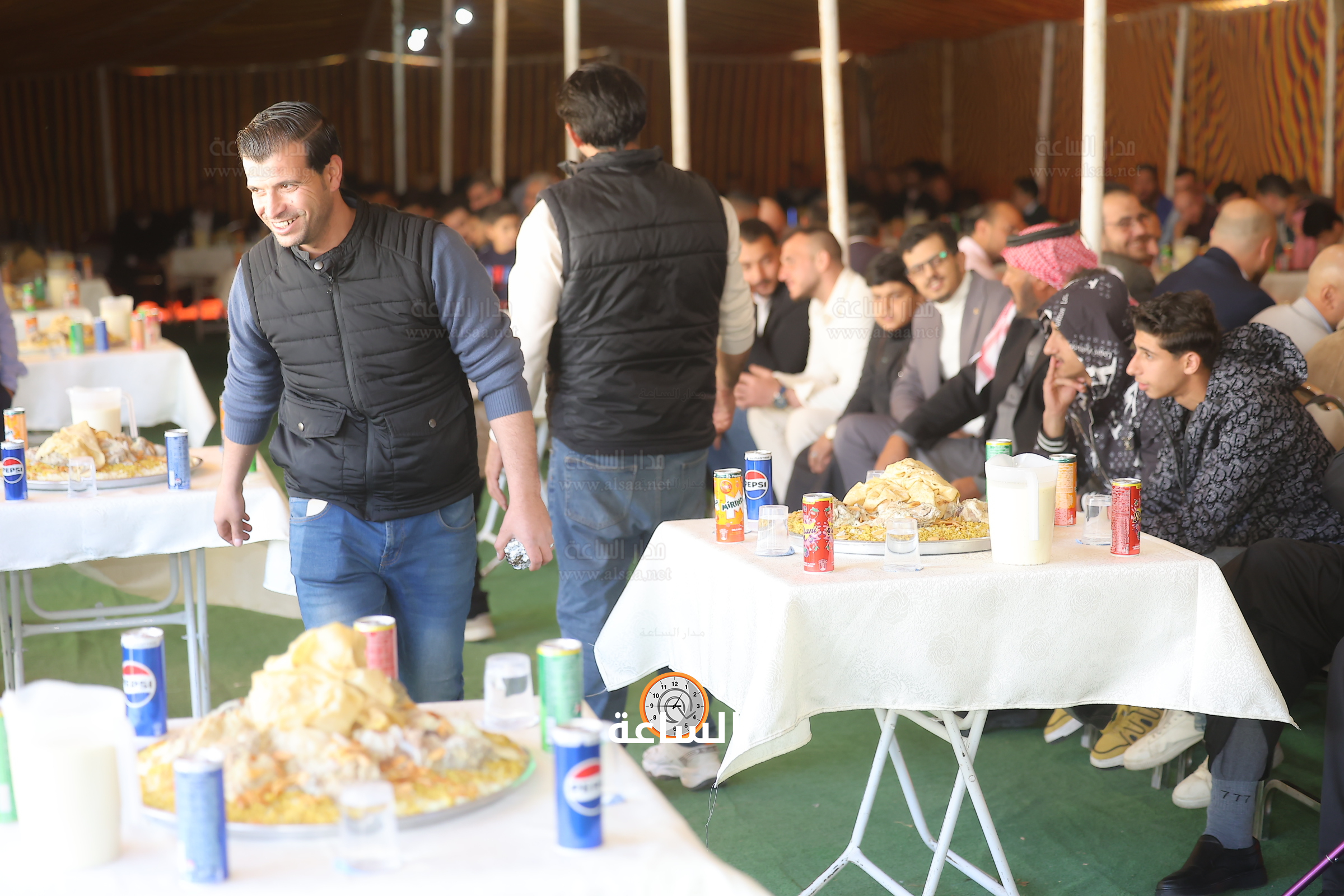 Madar Al-Saa Images 0.6665668249421137