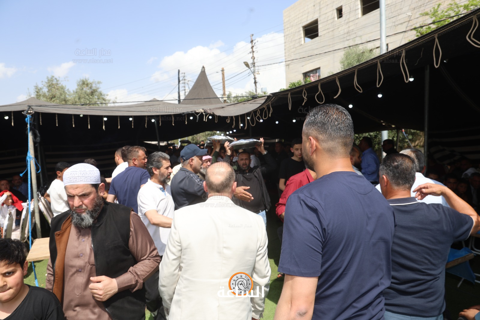 Madar Al-Saa Images 0.6999579406045595