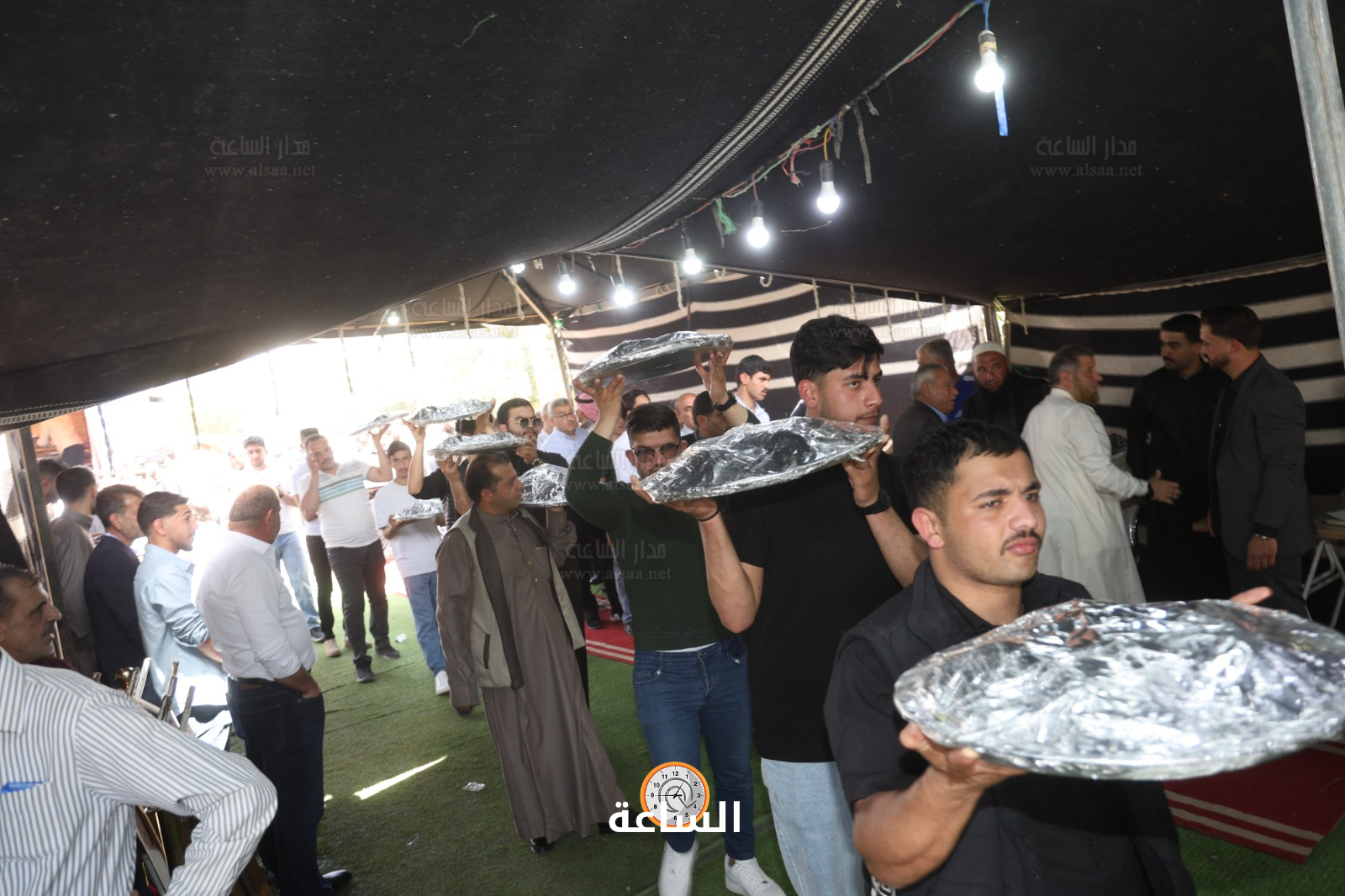 Madar Al-Saa Images 0.9887802708414992