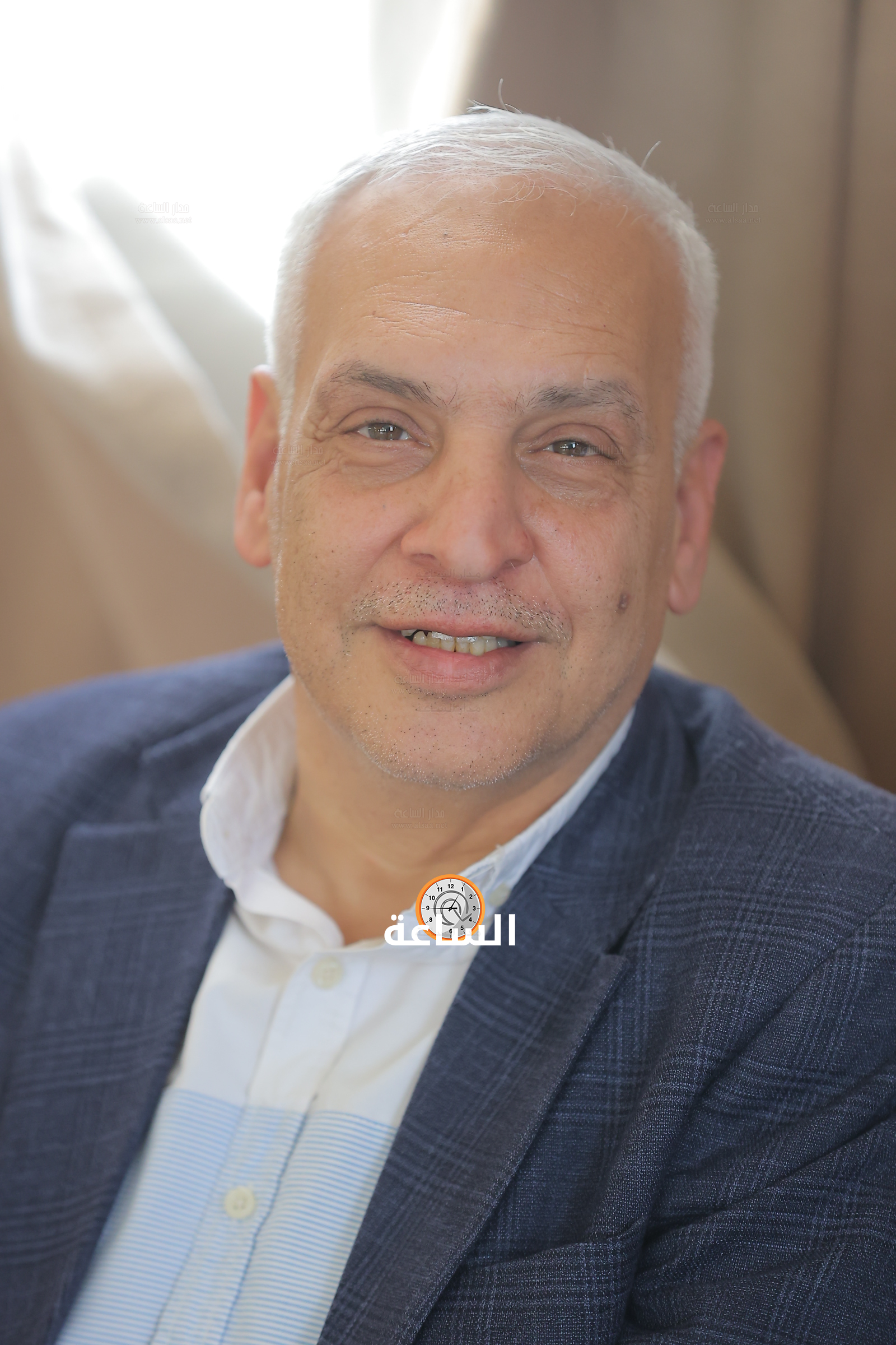 Madar Al-Saa Images 0.43255143963069587