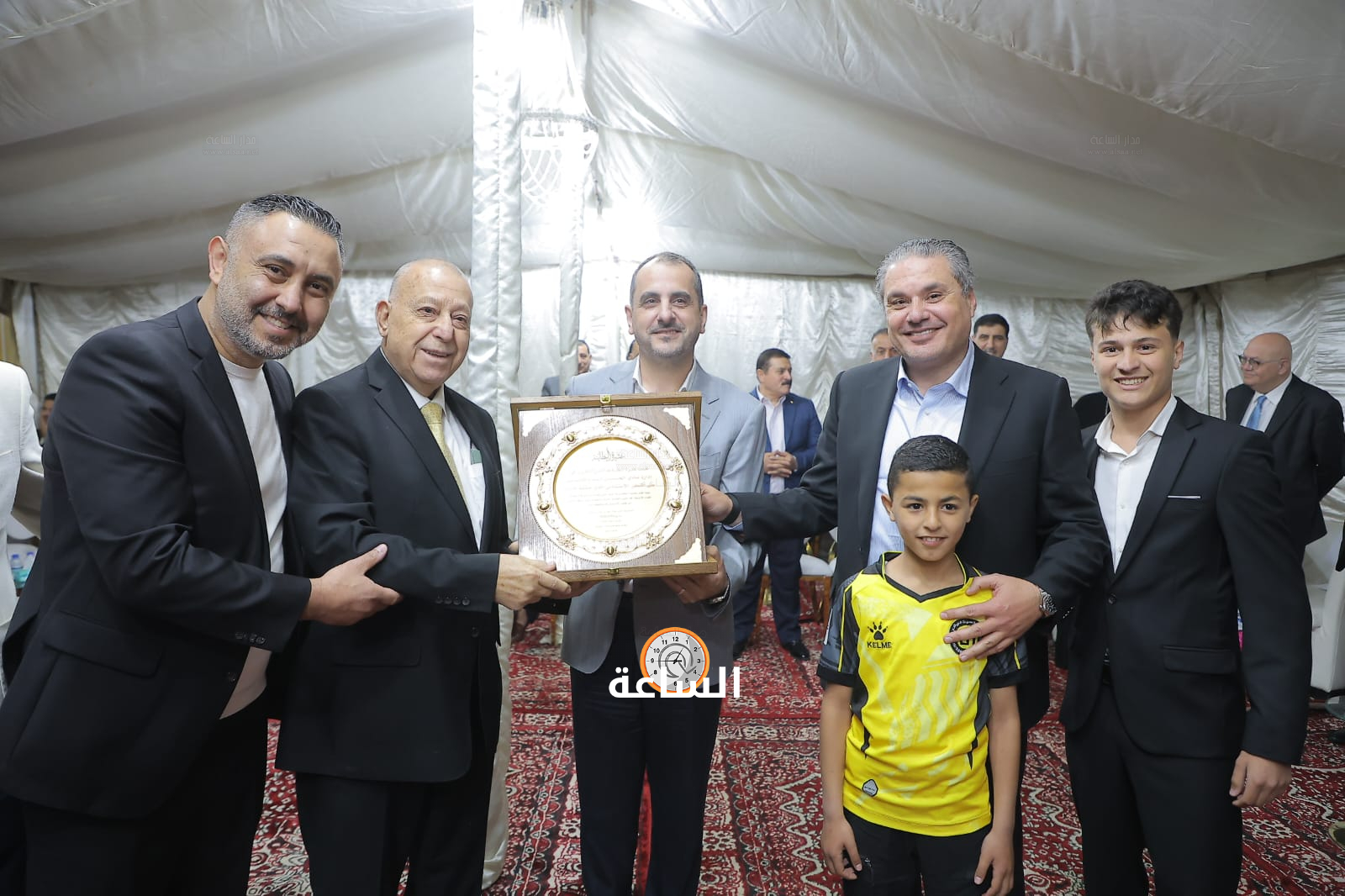 Madar Al-Saa Images 0.7668582178601488