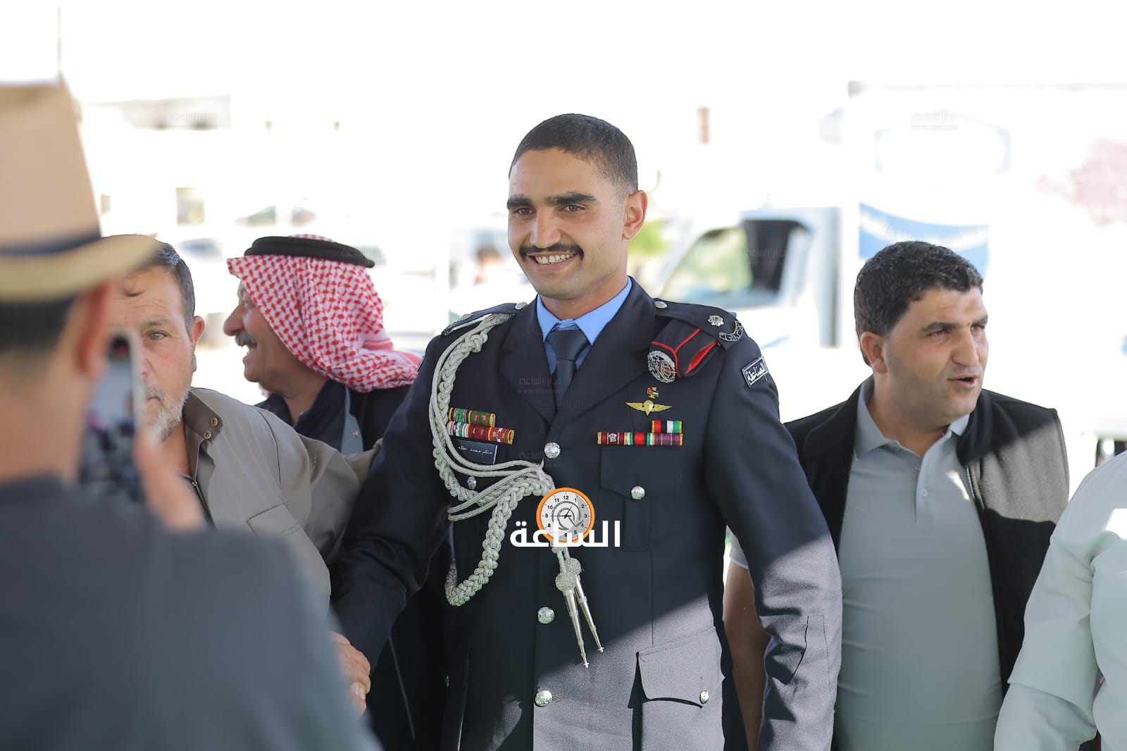 Madar Al-Saa Images 0.6947359476063681