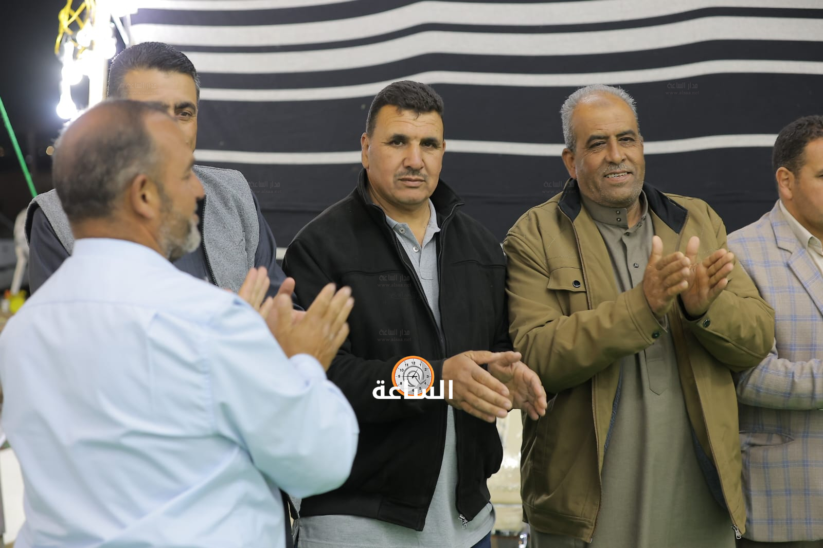 Madar Al-Saa Images 0.3573454054190053