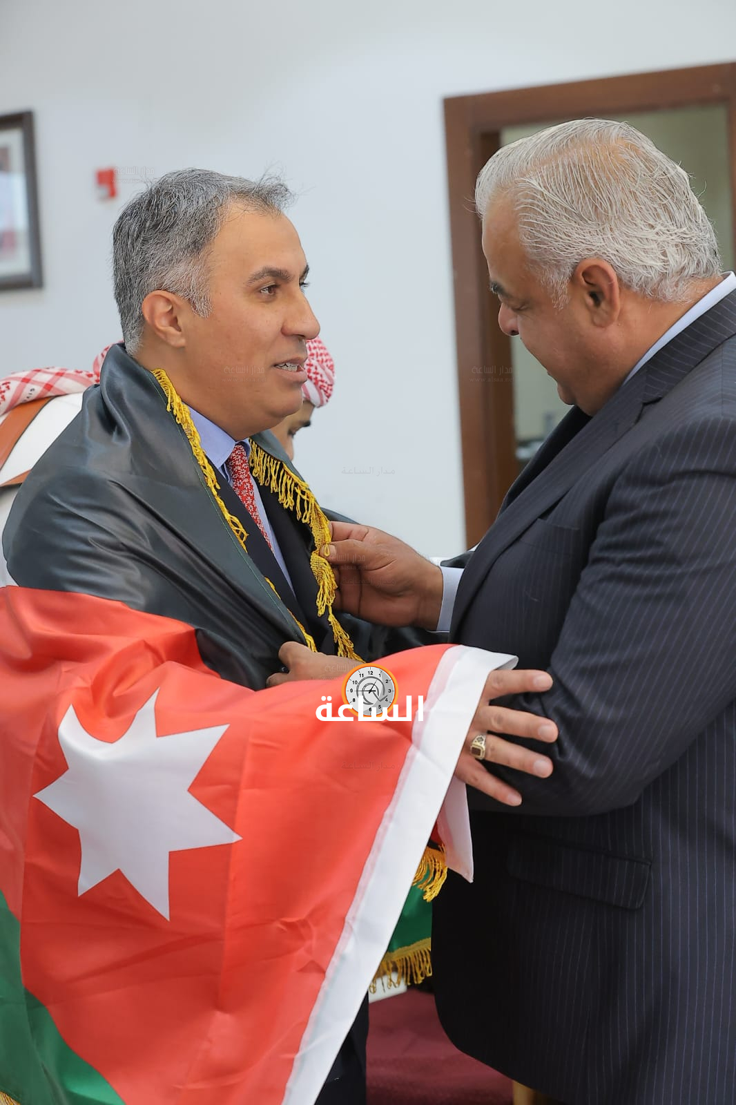 Madar Al-Saa Images 0.3200639796047633