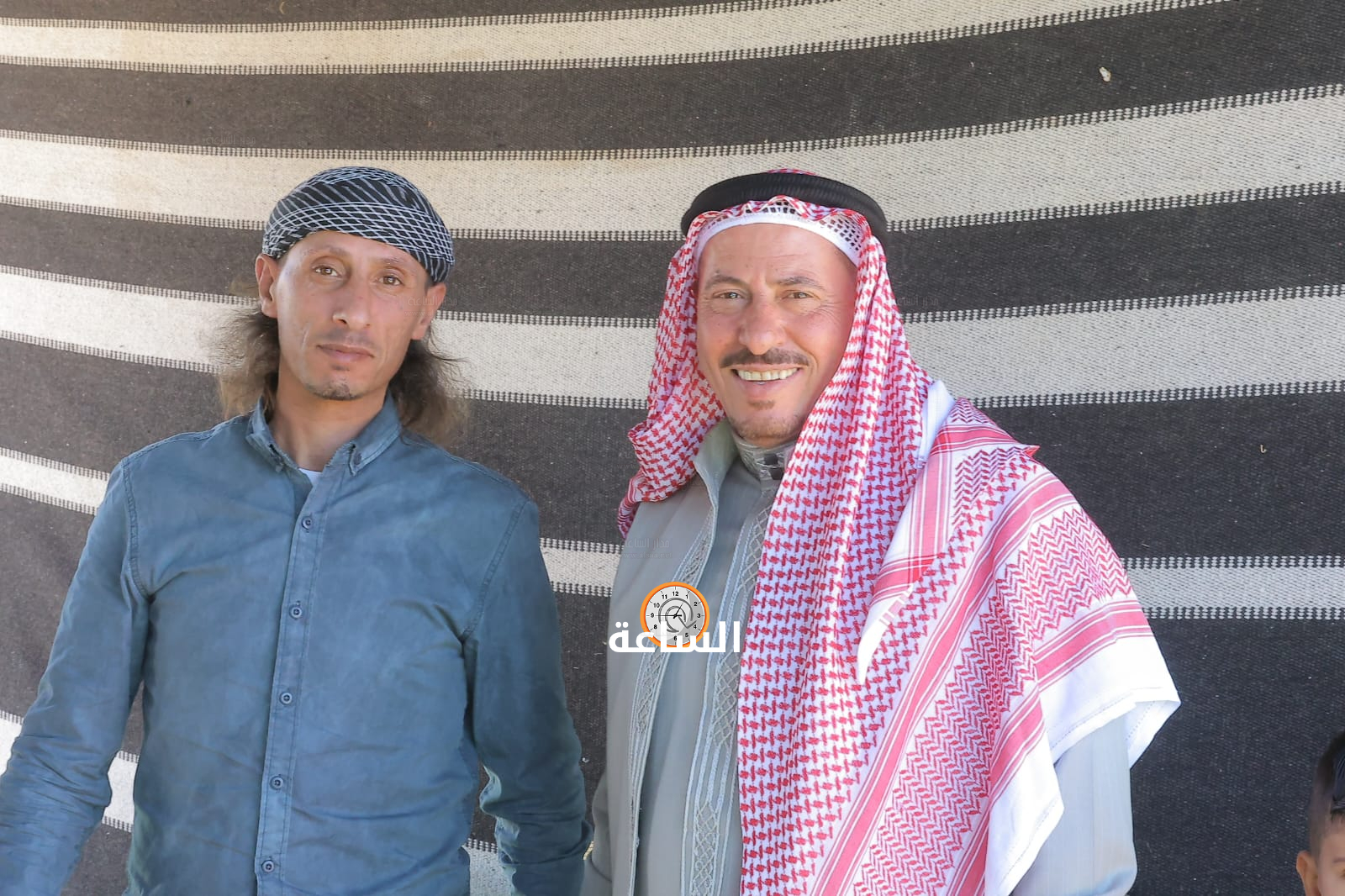 Madar Al-Saa Images 0.659372289168899