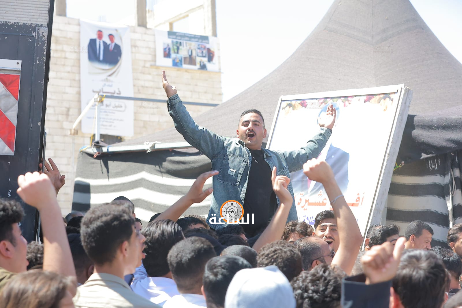 Madar Al-Saa Images 0.6993398156337612