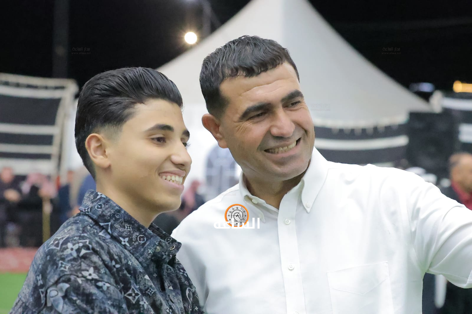 Madar Al-Saa Images 0.0020641033225264893