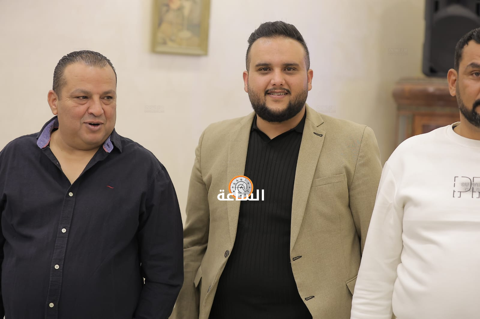 Madar Al-Saa Images 0.646097864097345