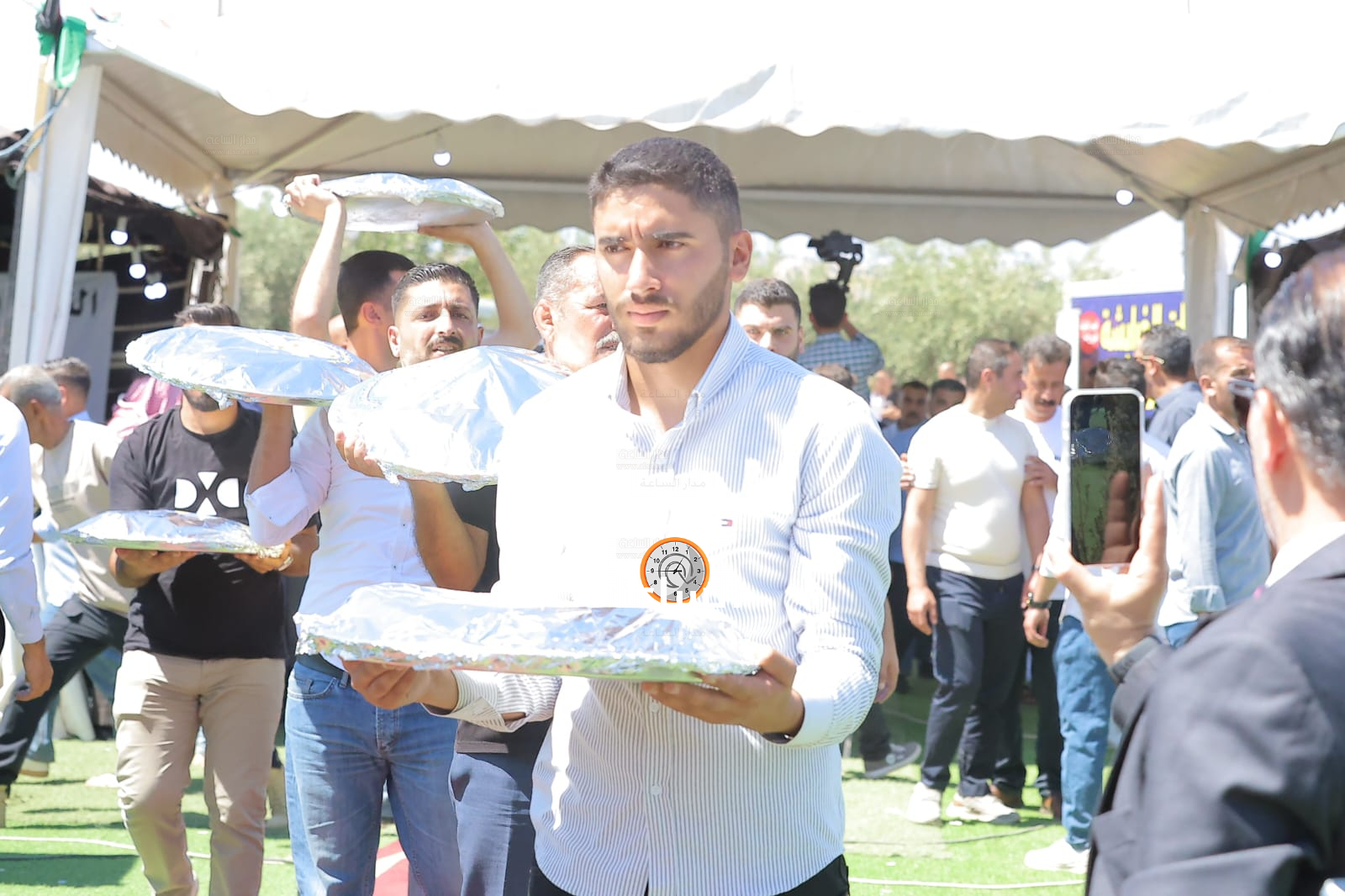 Madar Al-Saa Images 0.6265300128132496