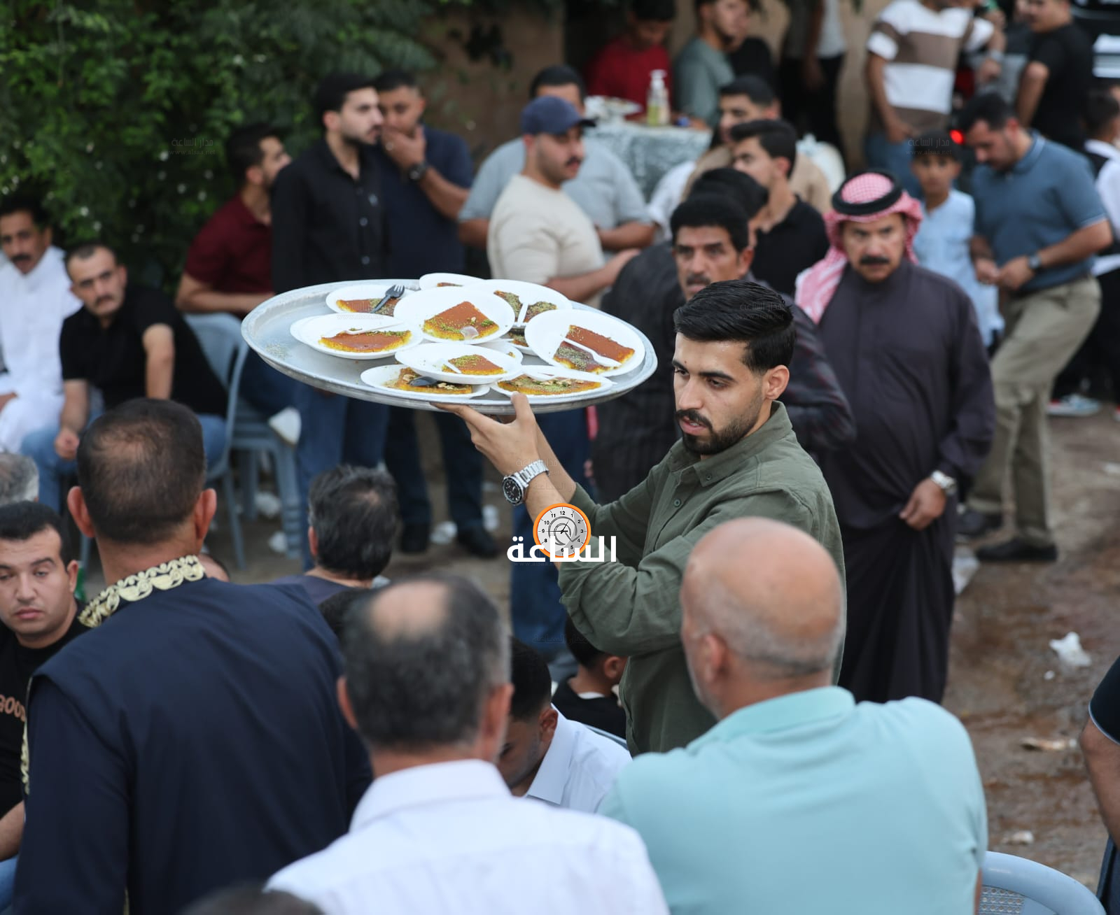 Madar Al-Saa Images 0.7961792423847286