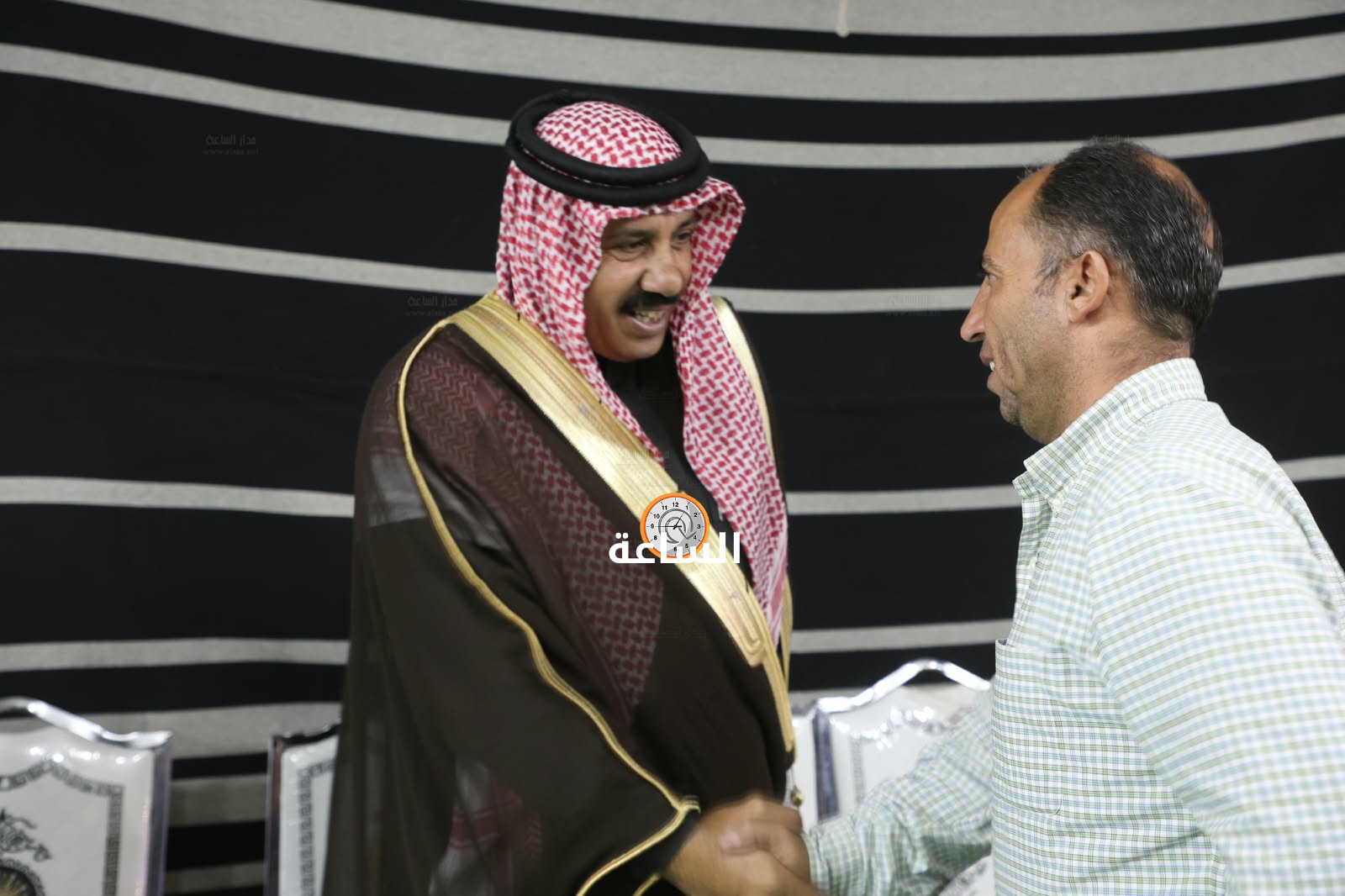 Madar Al-Saa Images 0.9619315675794312