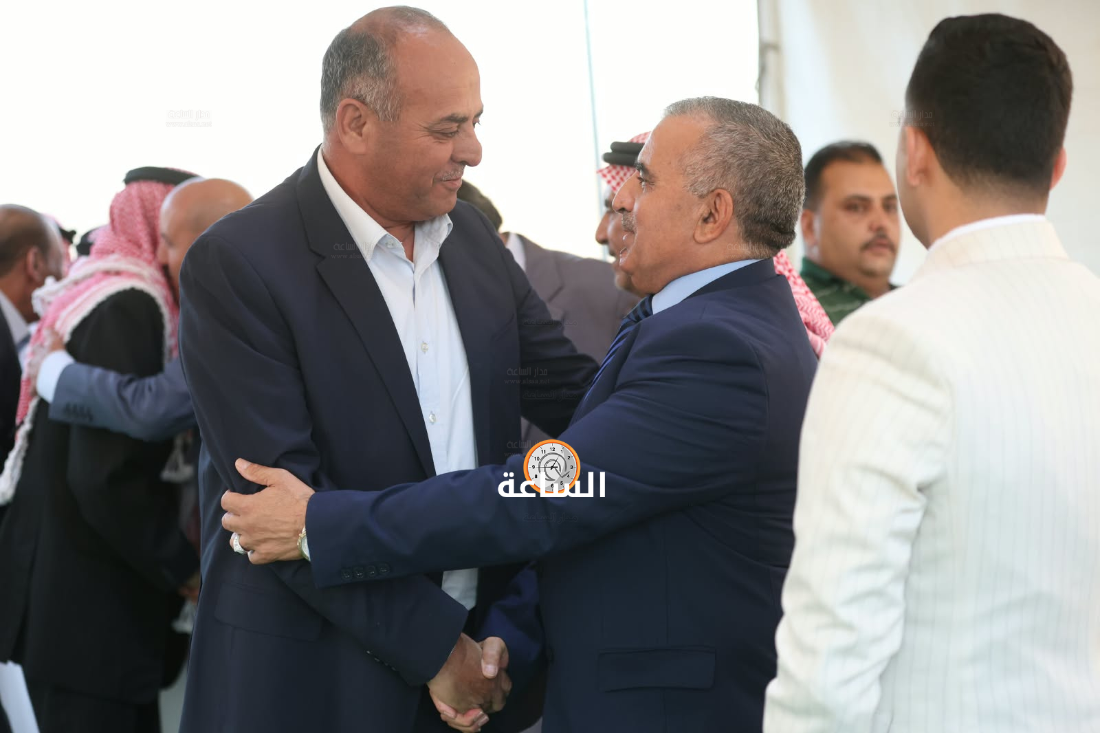 Madar Al-Saa Images 0.72066870435511