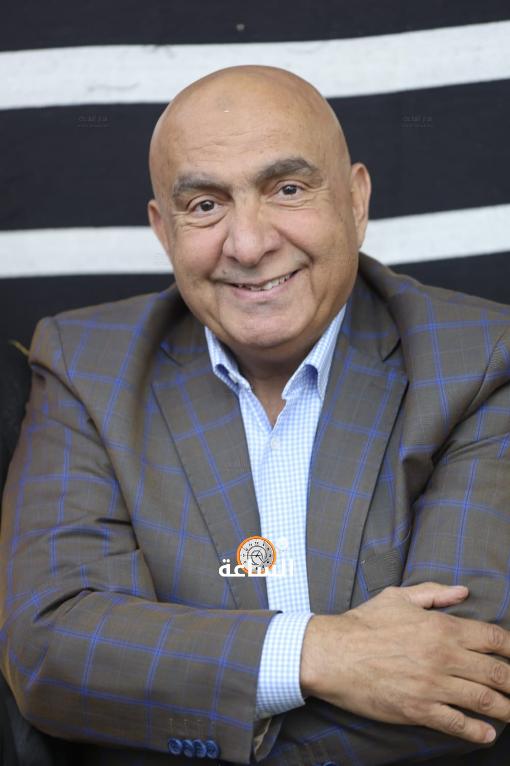 Madar Al-Saa Images 0.5438728783715082