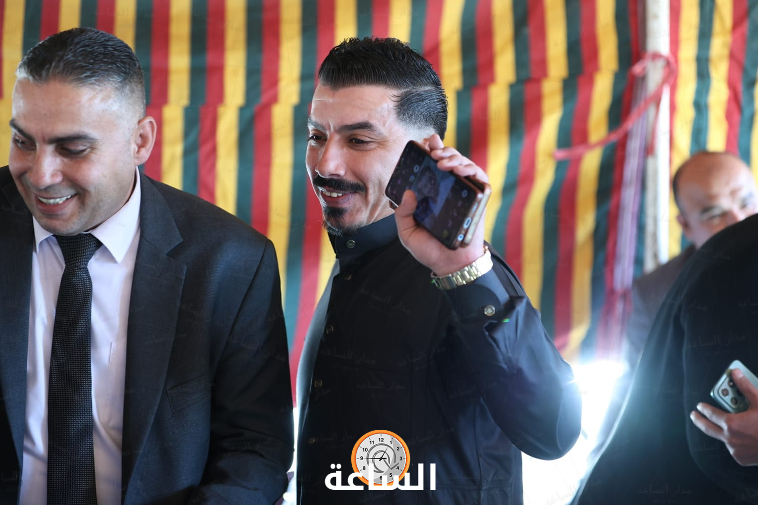 Madar Al-Saa Images 0.11369318306113319
