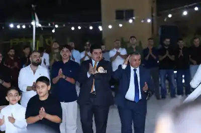 الخرابشة يحتفل بتخرج عاصم (صور)