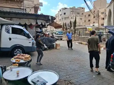 بلدية اربد تزيل البسطات بشارع الحسبة