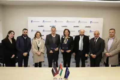 uwallet وصندوق المرأة للتمويل الأصغر يوقعان